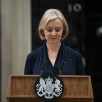British Prime Minister Liz Truss announces her resignation outside 10 Downing St. in London on Thursday. | AFP-JIJI