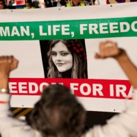 Demonstrators take part in the March of Solidarity for Iran in Washington on Oct. 15.   | AFP-JIJI