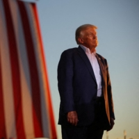 Former U.S. President Donald Trump holds a rally ahead of the midterm elections, in Mesa, Arizona, on Oct. 9. | REUTERS