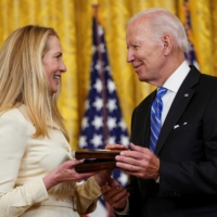 U.S. President Joe Biden greets Laurene Powell Jobs, widow of Medal of Freedom recipient Steve Jobs, in Washington in July.  | REUTERS






U.S. PRESIDENT BIDEN AWARDS PRESIDENTIAL MEDALS OF FREEDOM DURING WHITE HOUSE CEREMONY IN WASHINGTON