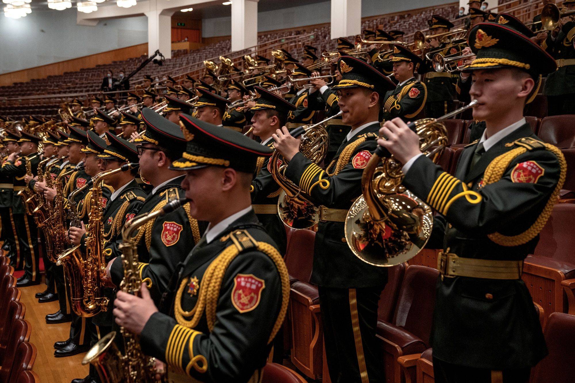 The Central Military Band of the People's Liberation Army plays the Communist Internationale during the closing ceremony of the Communist Party congress at Beijing's Great Hall of the People on Saturday. | BLOOMBERG