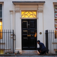 Then-British Chancellor of the Exchequer Rishi Sunak lights candles outside Downing Street ahead of the Hindu festival of Diwali, in London on Nov. 12, 2020.  | REUTERS