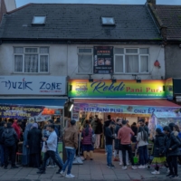 A celebration for Diwali, known as the festival of lights, in the Wembley area of northwest London, home to one of Britain’s largest Hindu communities, on Monday. Rishi Sunak’s ascent to the prime minister’s office is a significant milestone for Britain’s Indian diaspora, but for many, his immense personal wealth has made him less relatable.  | ANDREW TESTA / THE NEW YORK TIMES