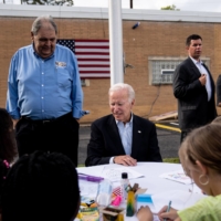 U.S. President Joe Biden talks with children during a Labor Day celebration in West Mifflin, Pennsylvania, on Sept. 5. With two weeks to go, Republicans are looking competitive in Democratic bastions like New York, California, Oregon and even Rhode Island. | ERIN SCHAFF / THE NEW YORK TIMES