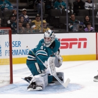 Golden Knights right winger Phil Kessel (right) scores against Sharks goalkeeper James Reimer during the first period in San Jose, California, on Tuesday. | USA TODAY / VIA REUTERS