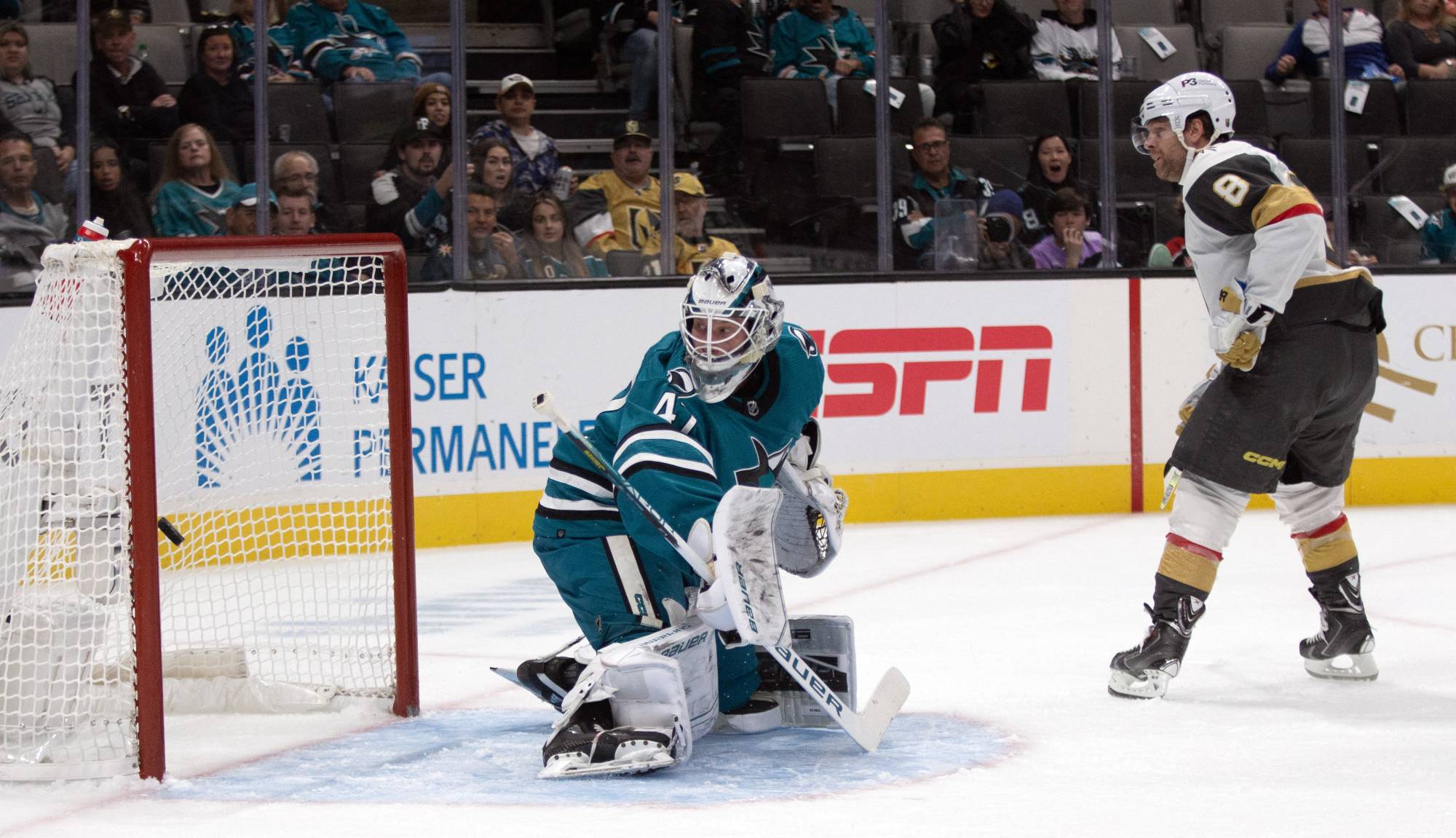 Golden Knights right winger Phil Kessel (right) scores against Sharks goalkeeper James Reimer during the first period in San Jose, California, on Tuesday. | USA TODAY / VIA REUTERS