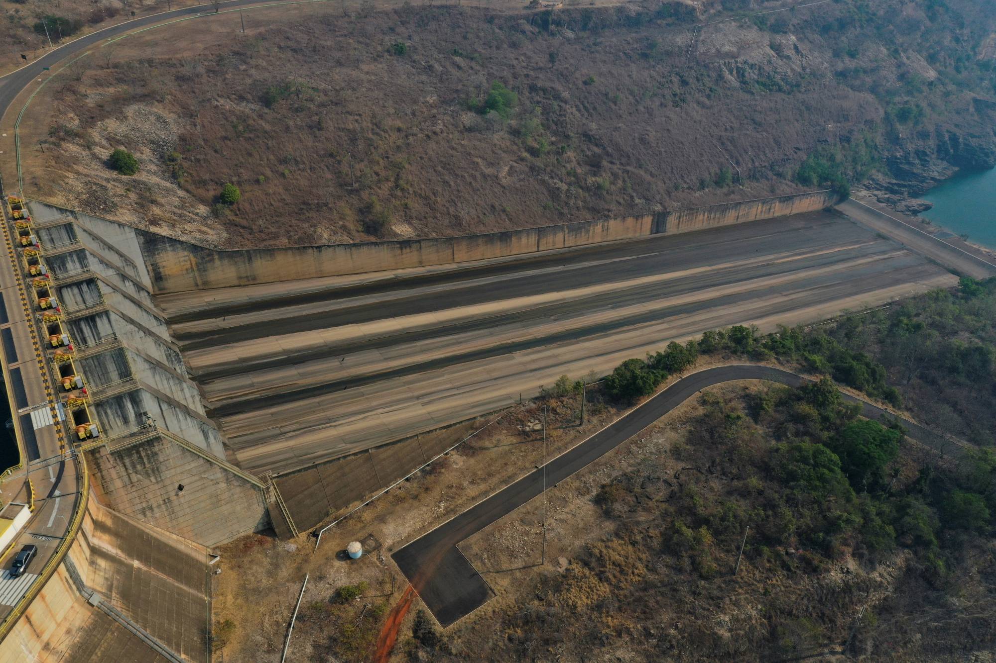 The Furnas hydroelectric dam in Sao Jose da Barra, Brazil, operates even when water levels are low. | REUTERS