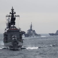 A Maritime Self-Defense Force (MSDF) destroyer leads a naval fleet review in Sagami Bay, off Kanagawa Prefecture, in 2012.  | REUTERS