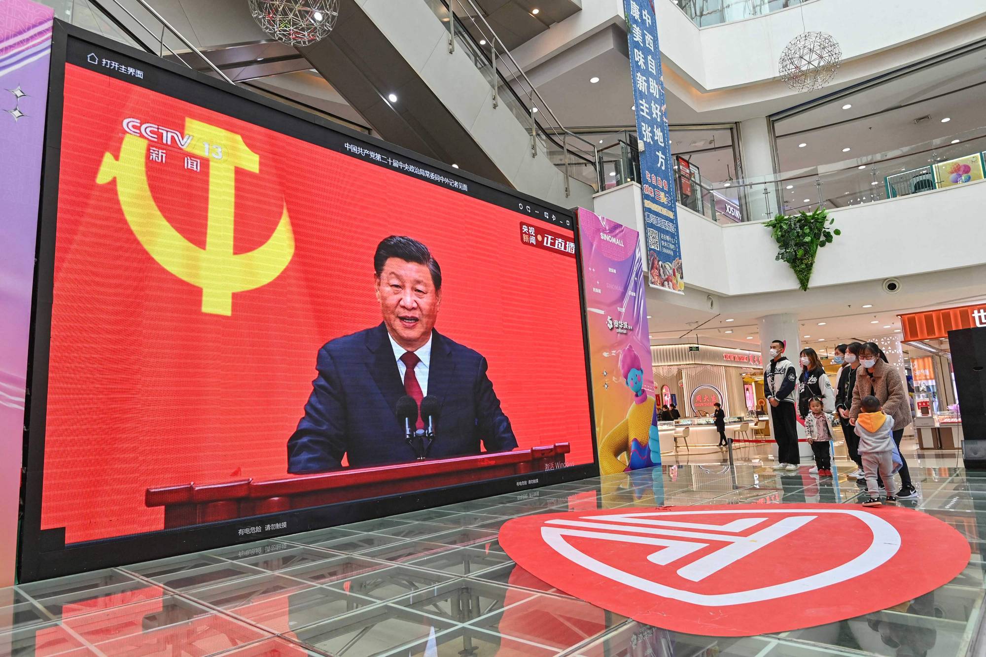 A live broadcast of Chinese leader Xi Jinping's speech during the introduction of the Communist Party of China's Politburo Standing Committee on Oct. 23.  | AFP-JIJI