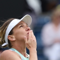 Simona Halep has been provisionally suspended for doping after two blood samples from the U.S. Open in September tested positive. | AFP-JIJI