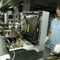 Women factory workers assemble television sets at a plant in the city of Qingdao, China.    | REUTERS