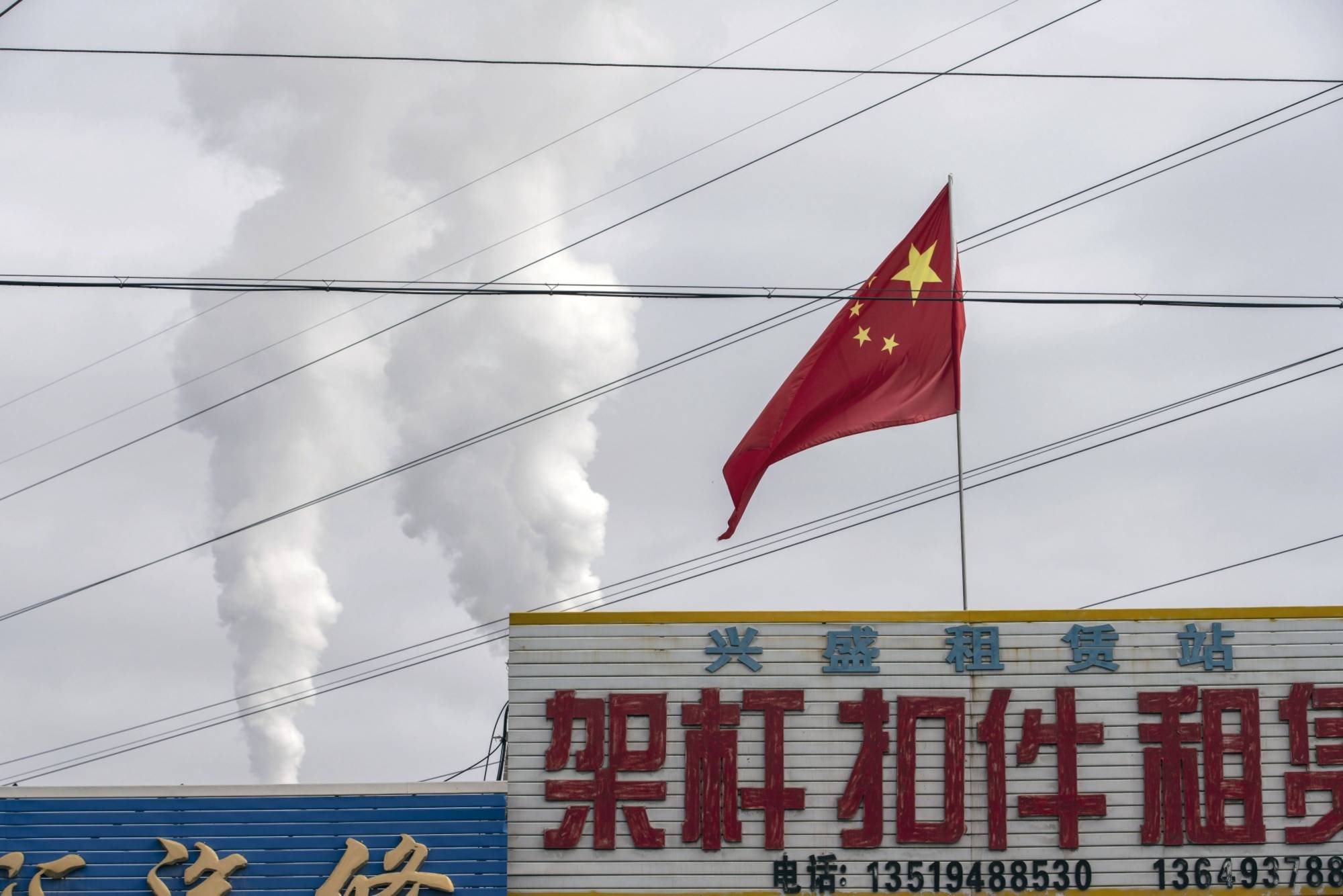 Despite being the world's leading installer of clean energy, China is investing in a vast array of new coal-fired power plants. | Bloomberg