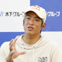 Tokyo Olympic surfing silver medalist Kanoa Igarashi speaks during an interview in Tokyo on Wednesday. | KYODO
