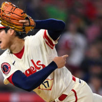 Los Angeles Angels starting pitcher Shohei Ohtani throws to the plate in the fourth inning against the Oakland Athletics at Angel Stadium last month. | JAYNE KAMIN-ONCEA USA TODAY SPORTS / VIA REUTERS