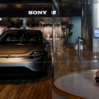 Sony\'s Vision-S Prototype vehicle at its headquarters in Tokyo in March. The evolution of cars is expected to further blur the boundary between the auto sector and other fields. | REUTERS
