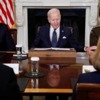 U.S. President Joe Biden, Defense Secretary Lloyd Austin (left) and Chairman of the Joint Chiefs of Staff, Army Gen. Mark Milley, meet with Defense Department leaders at the White House on Oct. 26. | REUTERS