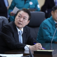 South Korean President Yoon Suk-yeol attends a meeting of the National Security Council over North Korea\'s missile launch, at the presidential office in Seoul, on Wednesday.  | SOUTH KOREAN PRESIDENTIAL OFFICE / YONHAP / VIA AFP-JIJI