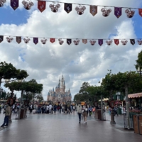 People visit Shanghai Disney Resort on Monday amid a COVID-19 outbreak in the city. | REUTERS