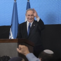 Benjamin Netanyahu speaks at the Likud Party headquarters in Jerusalem on election night in Israel on Tuesday. | AMIT ELKAYAM / THE NEW YORK TIMES

