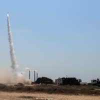 Israel\'s Iron Dome anti-missile system fires to intercept a rocket launched from the Gaza Strip toward Israel in August. | REUTERS