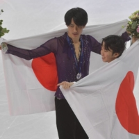 Silver medalist Sota Yamamoto (left) and bronze winner Kazuki Tomono pose after the medal ceremony of the Grand Prix de France in Angers on Saturday. | AFP-JIJI