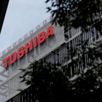 Japan\'s big banks are concerned about preferred bidder JIP\'s plan to retain Toshiba management, sources say. | REUTERS
