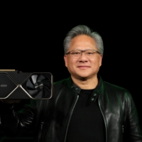 Nvidia CEO Jensen Huang holds one of the company\'s new RTX 4090 chips for computer gaming in this undated handout photo provided Sept. 20. | COURTESY OF NVIDIA CORP/HANDOUT VIA REUTERS 