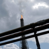 A tower flaring gas at an LNG processing plant in Rivers state, Nigeria in 2017. | REUTERS