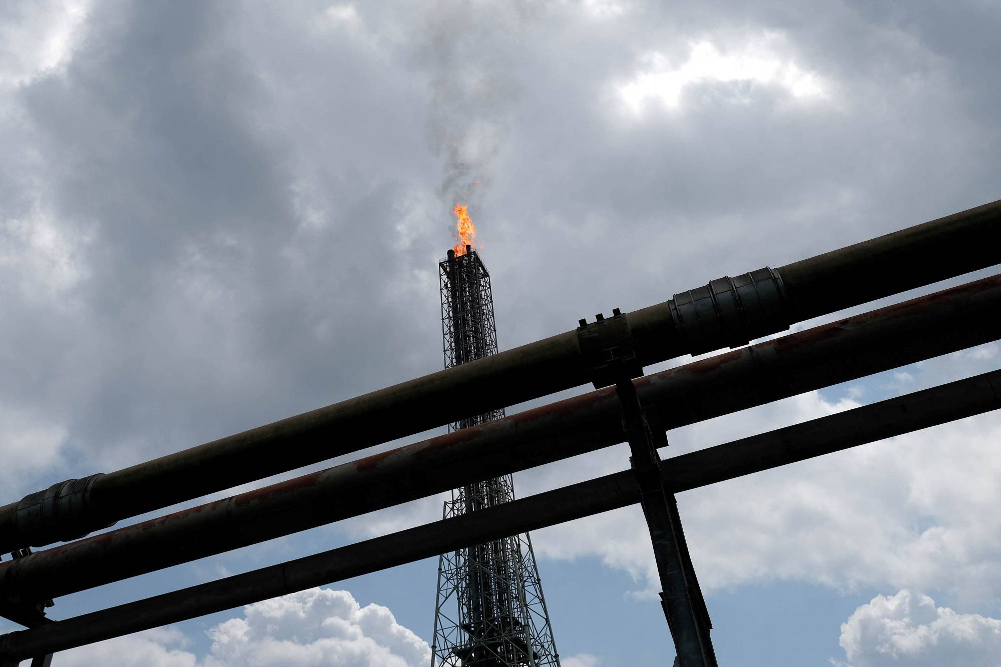 A tower flaring gas at an LNG processing plant in Rivers state, Nigeria in 2017. | REUTERS