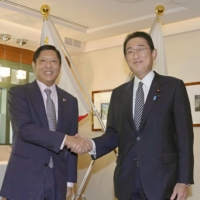 Philippine President Ferdinand Marcos Jr. and Prime Minister Fumio Kishida meet on Sept. 21 in New York.  | KYODO