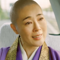 Shinobu Terajima plays a fictional version of Jakucho Setouchi, a celebrated novelist turned Buddhist nun, in Ryuichi Hiroki’s “2 Women.” | © 2022 “2 WOMEN” FILM PARTNERS
