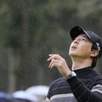 Ryo Ishikawa reacts after winning his first tournament in three years at the Taihei Masters in Gotemba, Shizuoka Prefecture, on Sunday. | KYODO