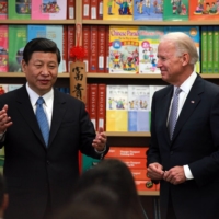 Xi and Biden, then both vice presidents of their respective countries, speak with students at the International Studies Learning Center, a high school in South Gate, California, in February 2012. | MONICA ALMEIDA / THE NEW YORK TIMES