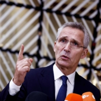 NATO Secretary General Jens Stoltenberg delivers a speech as he arrives for a Foreign Affairs Council at the EU headquarters in Brussels on Tuesday | AFP-JIJI