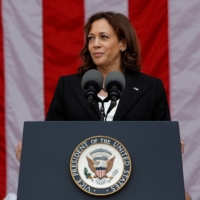 U.S. Vice President Kamala Harris speaks at a Veterans Day event at Arlington National Cemetery in Arlington, Virginia, on Friday. | REUTERS