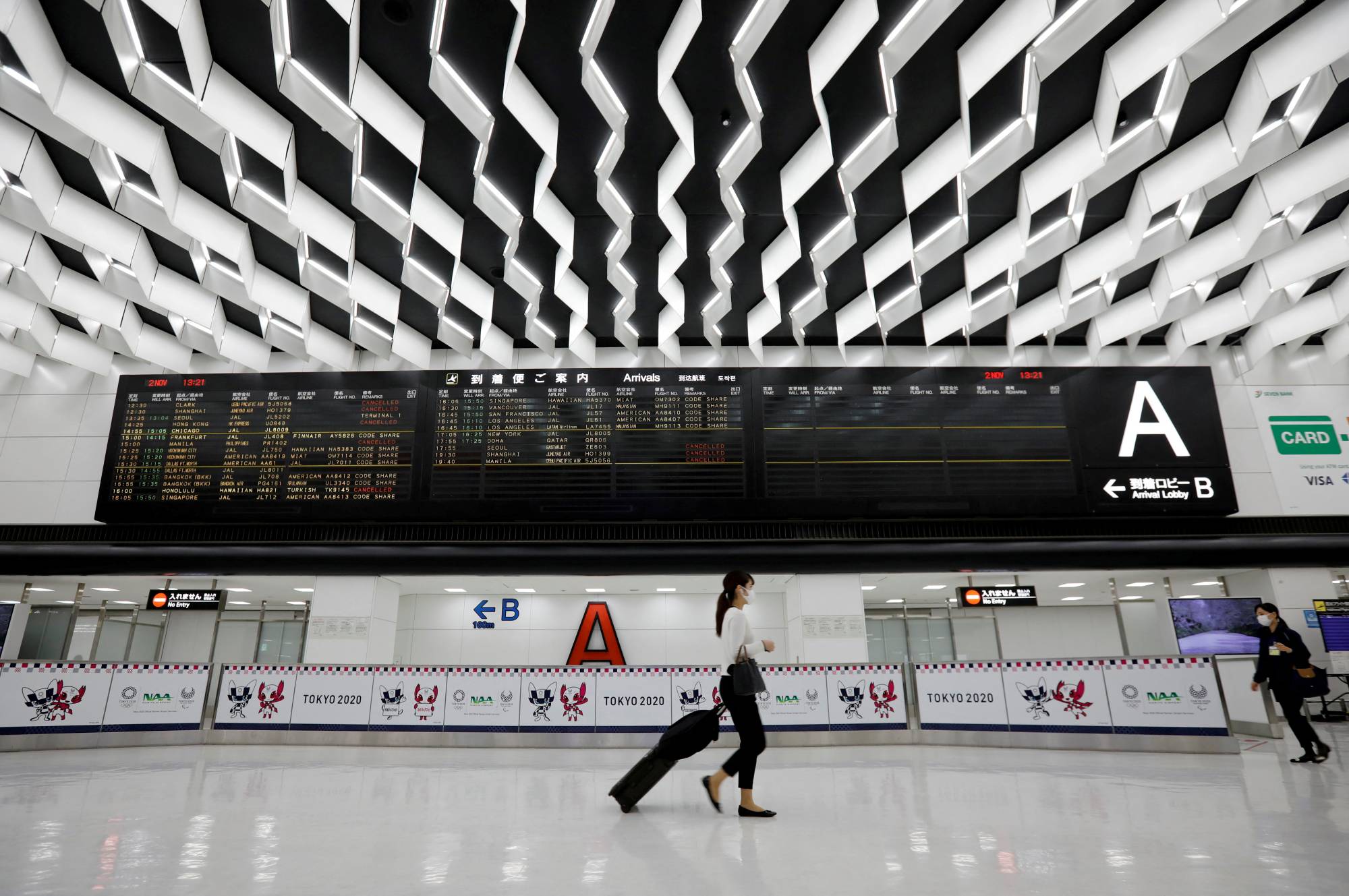 Narita Airport on Nov. 2. A total of 349,600 people in Japan made trips overseas in October, slightly higher than the 319,165 recorded in September, as travel resumes following the end of COVID-19 restrictions.  | REUTERS