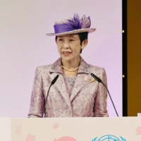 Princess Hisako speaks at an event in Kyodo in March 2021. The princess has become the fifth member of the imperial family to contract COVID-19. | POOL / VIA KYODO