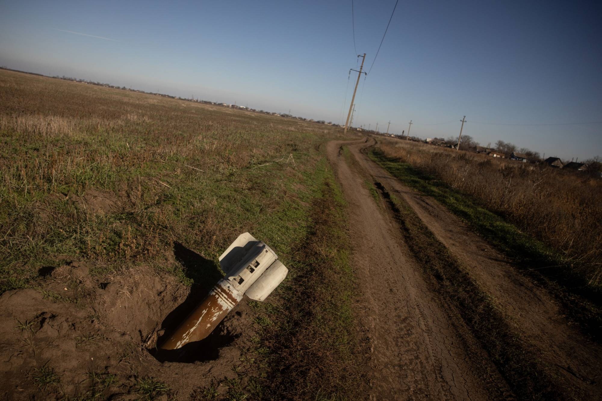 The remnants of a Russian rocket in Mykolaiv, Ukraine, on Tuesday. Ukraine's Defense Ministry said that while it shot down 73 of more than 90 Russian missiles aimed at Kyiv and other cities on Tuesday, enough still got through to cause extensive damage | GETTY IMAGES / VIA BLOOMBERG 