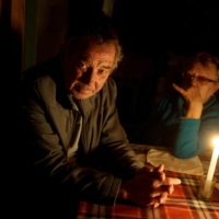 Vitalii Serdiuk, who says he was tortured by Russian service members, and his wife, Olena. | REUTERS 