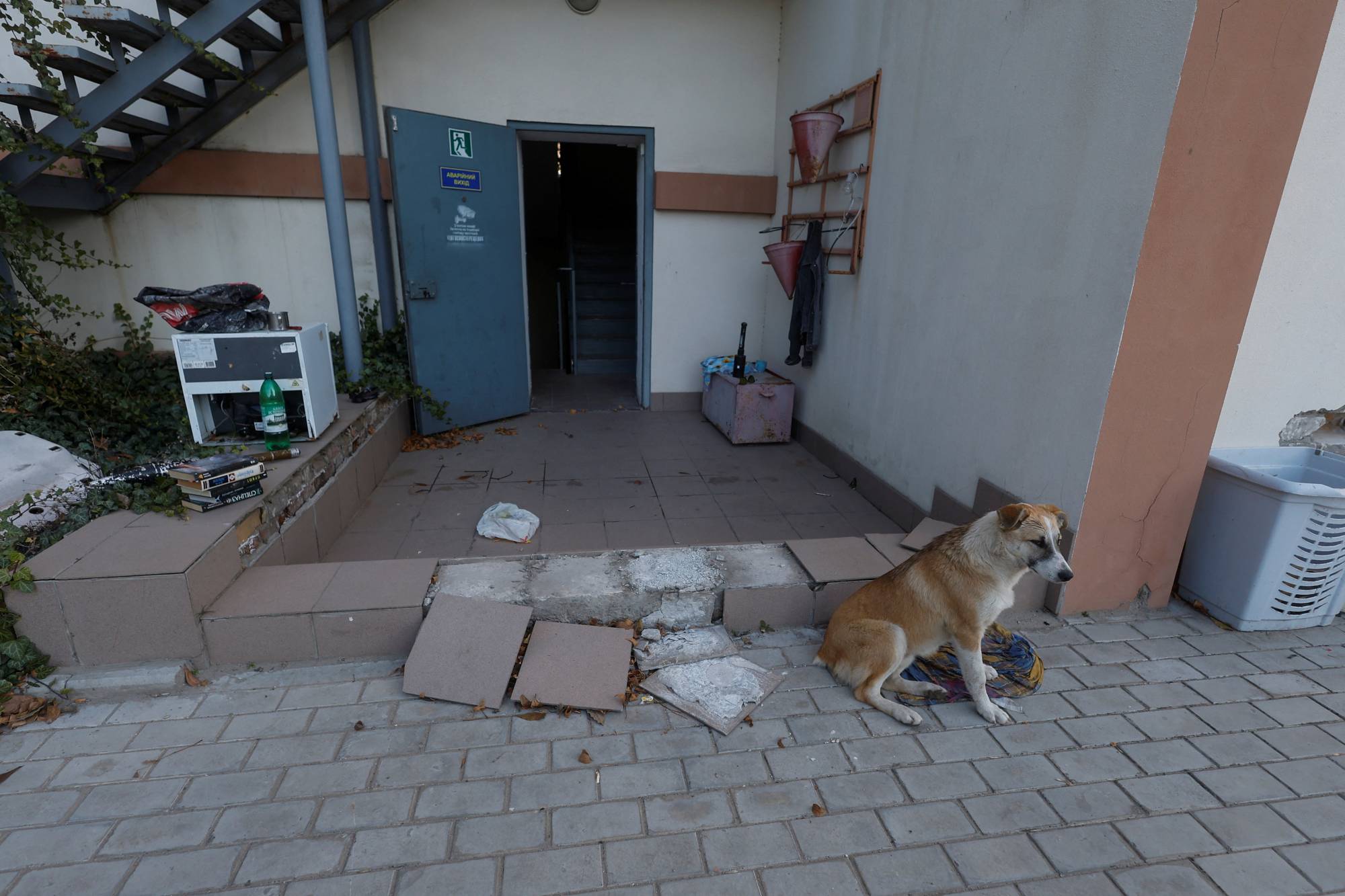 An entrance to a police station which Ukrainians say was used by Russian service members for jailing and torturing people before Russia's retreat from Kherson | Reuters 