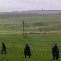 Police investigators on Wednesday in the fields near the site where a missile strike killed two men in Przewodow | AFP-JIJI
