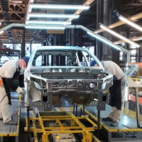 Employees work on the assembly line of the Lada Izhevsk automobile plant, part of the Avtovaz Group, in Izhevsk, Russia, on Feb. 22. Lada was Russia\'s bestselling car marque in 2021. | REUTERS