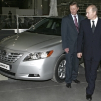 Russian President Vladimir Putin attends the opening ceremony of a Toyota plant in St. Petersburg, the firm\'s first in Russia, in December 2007.  | KREMLIN / RIA NOVOSTI / VIA REUTERS