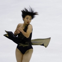 Kaori Sakamoto performs her short program during the NHK Trophy in Sapporo on Friday. | REUTERS