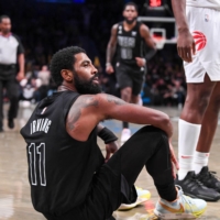 Nets guard Kyrie Irving was suspended by his club for eight games after refusing to apologize for anti-Semitic comments on Twitter. | USA TODAY / VIA REUTERS