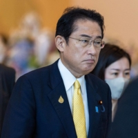 Prime Minister Fumio Kishida attends the Asia-Pacific Economic Cooperation summit in Bangkok on Saturday. | BLOOMBERG