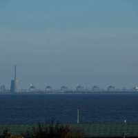 The Zaporizhzhia nuclear power plant in Ukraine. More than a dozen blasts shook the facility, Europe\'s largest nuclear power plant, on Saturday evening and Sunday, the International Atomic Energy Agency said. | REUTERS