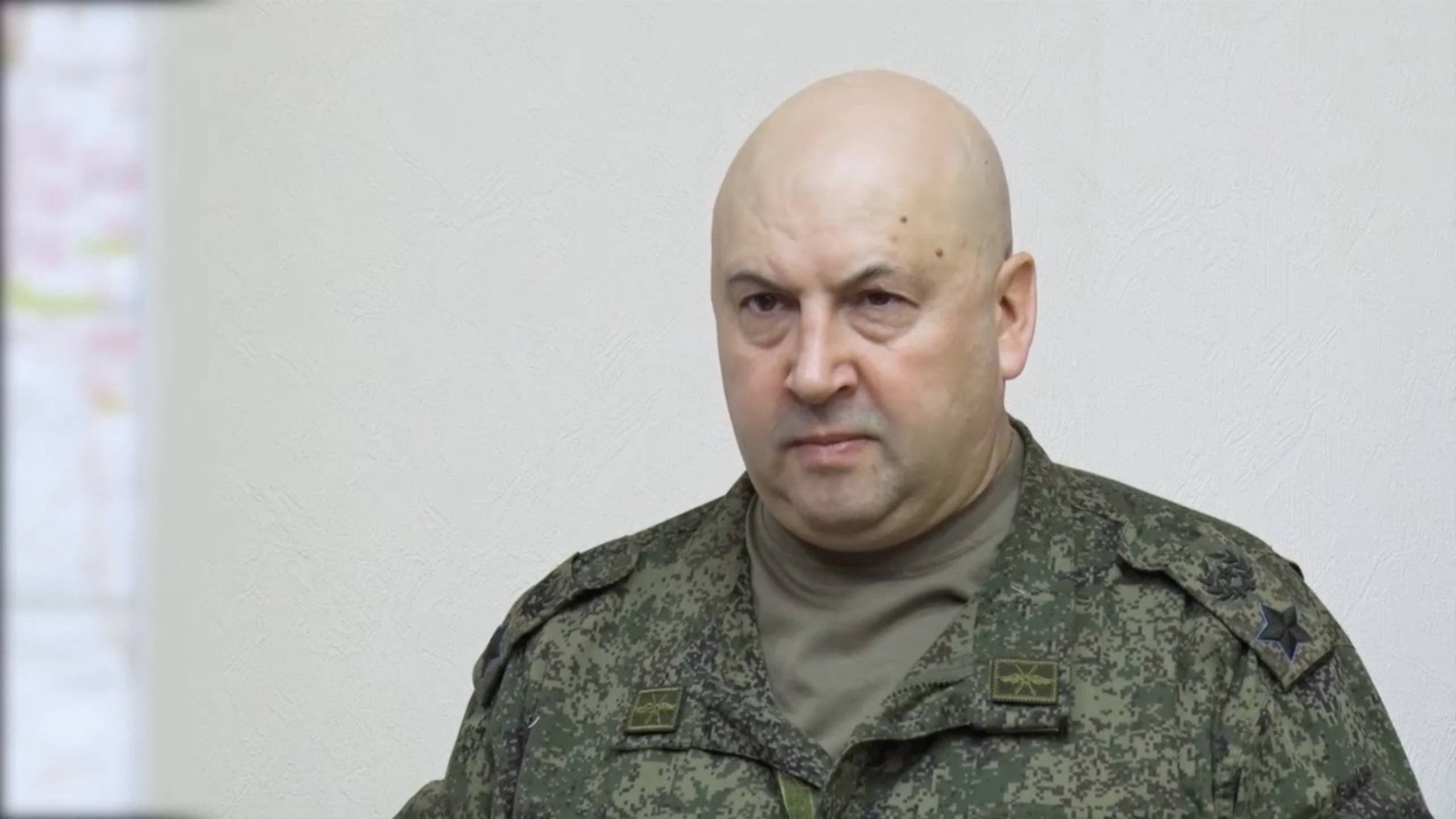Gen. Sergei Surovikin, commander of Russian forces in Ukraine, makes a report during a meeting with officials of the Russian Defense Ministry in an unknown location, in this still image taken from video released on Nov. 9. | RUSSIAN DEFENSE MINISTRY / VIA REUTERS