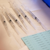 Syringes ready to be administered to residents who are over 50 years old, immunocompromised and are eligible to receive their second COVID-19 vaccine booster shots. | REUTERS