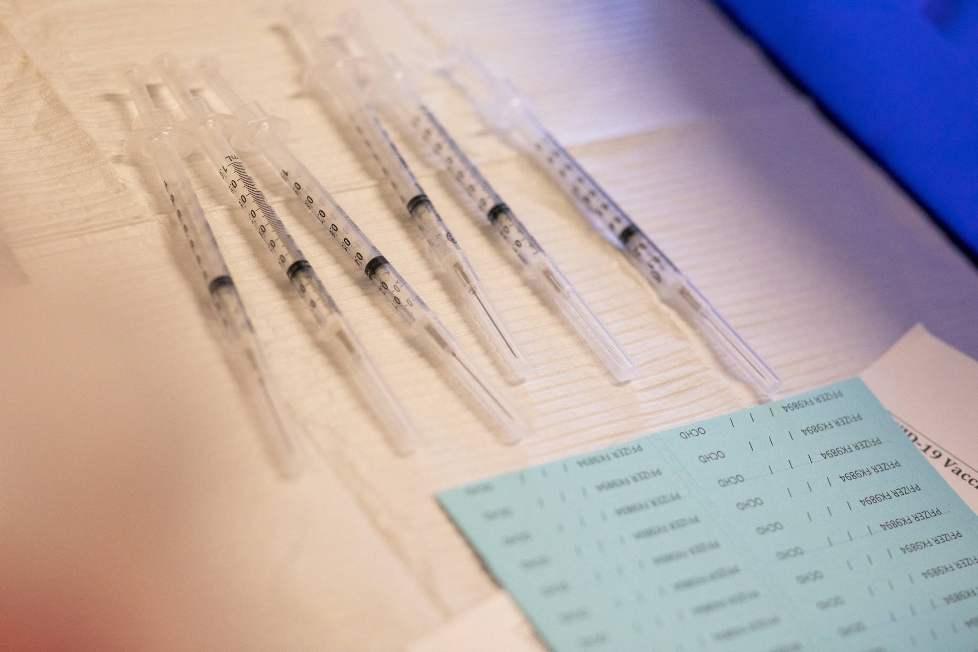 Syringes ready to be administered to residents who are over 50 years old, immunocompromised and are eligible to receive their second COVID-19 vaccine booster shots. | REUTERS